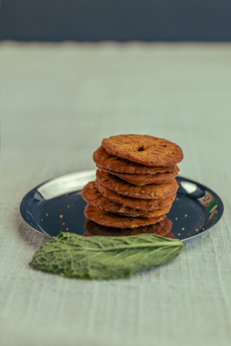 A stack of crisp thattai on a plate