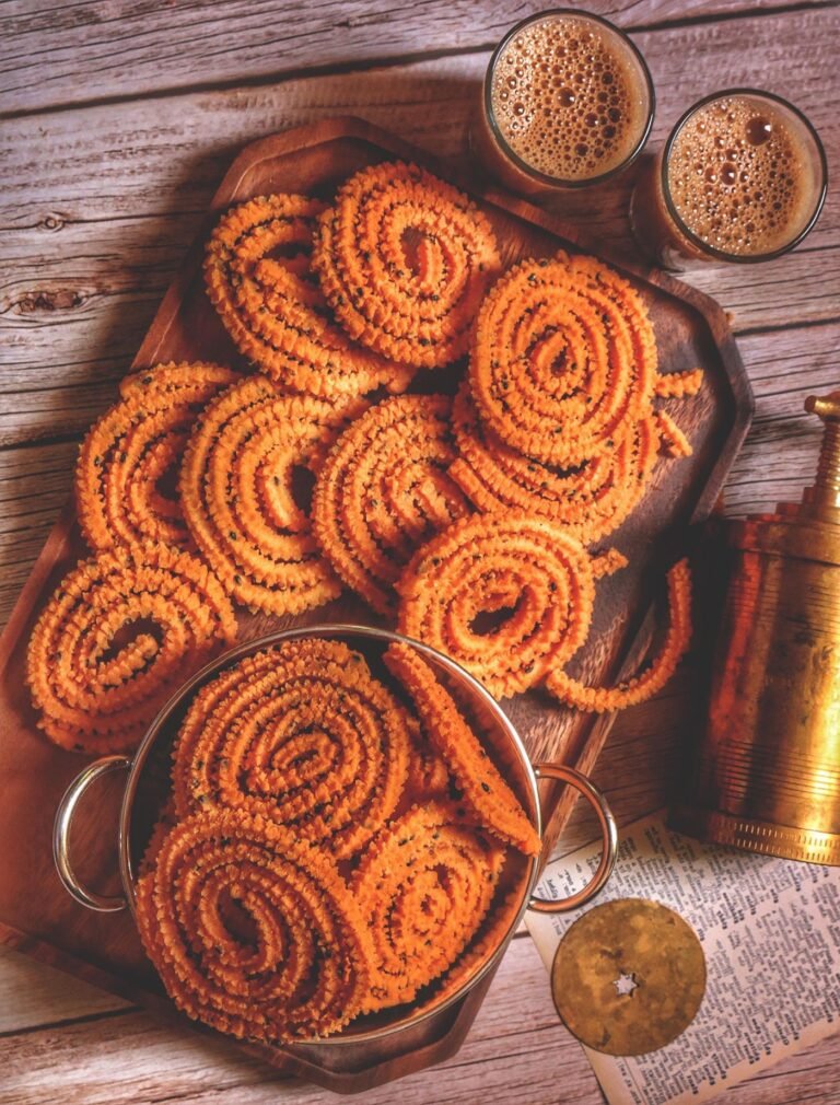 Close-up of golden murukku spirals