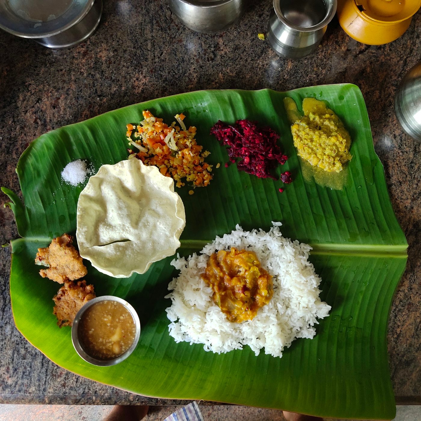 A traditional South Indian meal on a banana leaf